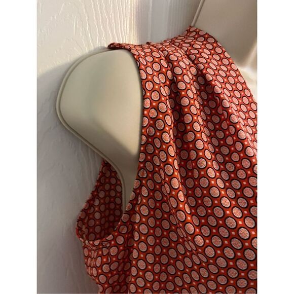 Women's Orangey Red Sleeveless Top. Size Medium. Circular pattern. - Picture 3 of 4